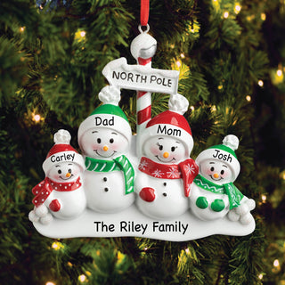 snowman ornament with family names of 4