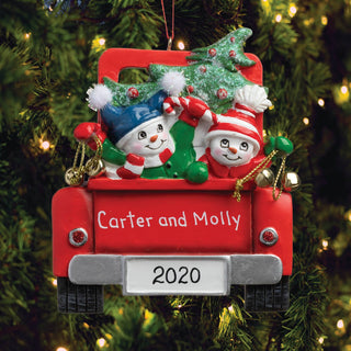 Snowman family in red truck ornament and names