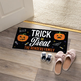 Trick or treat doormat with family name 