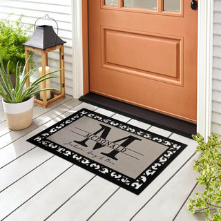 Our family doormat with name and initial
