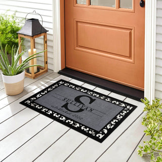 Our family doormat with name and initial