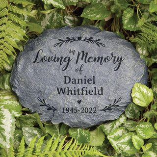 In loving memory garden stone with a name and date