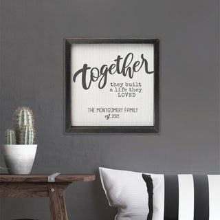 Together black framed wood art