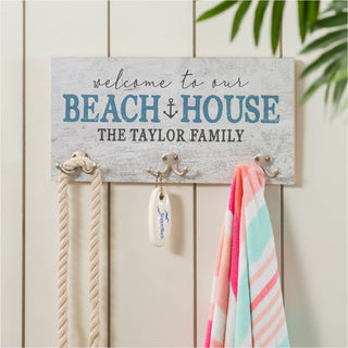 Welcome to our beach house coat hanger with family name