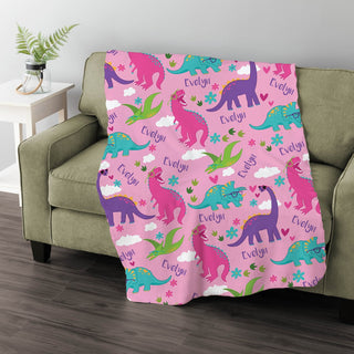 Colorful dinosaur fuzzy blanket with name