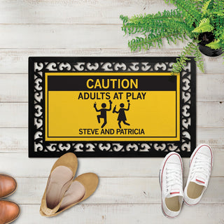 Caution adults at play narrow doormat with frame 