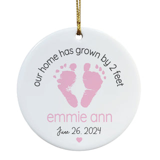 Our Home Has Grown By 2 Feet Baby Pink Personalized Round Ceramic Ornament