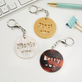 Round Acrylic Keyring with cut out hearts and name