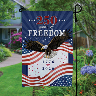 Patriotic garden flag featuring a soaring bald eagle with an American flag background, and the phrase “250 Years of Freedom.”