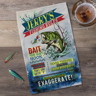 Humorous fishing towel personalized with name and includes fun fishing rules