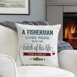 A 17" pillow with fishing graphic reading A fisherman lives here with the catch of his life personalized with your message